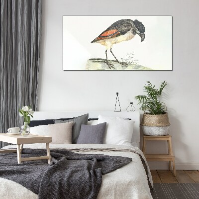 Glasbild Ein Vogel vor einem natürlichen Hintergrund