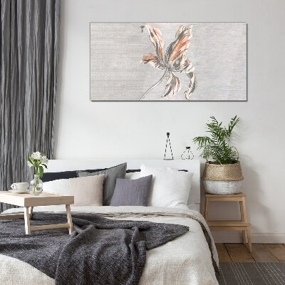 Glasbild Eine zarte Blume auf grauem Hintergrund