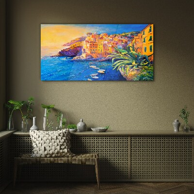 Glasbild Eine farbenfrohe Stadt am Meer