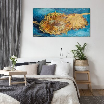 Glasbild Sonnenblume auf blauem Hintergrund