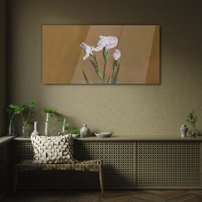 Glasbild Irisblüten auf braunem Hintergrund