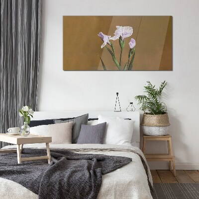 Glasbild Irisblüten auf braunem Hintergrund