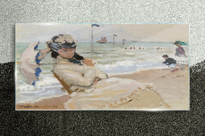 Glasbild Frau am Strand mit einem Sonnenschirm