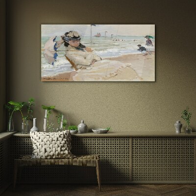 Glasbild Frau am Strand mit einem Sonnenschirm