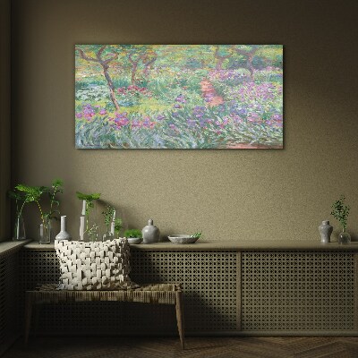 Glasbild Blumengarten in der Frühlingssonne