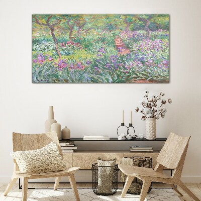 Glasbild Blumengarten in der Frühlingssonne