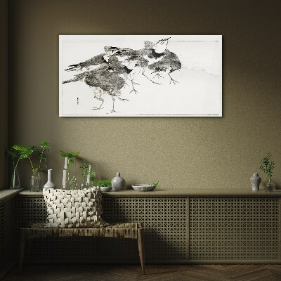 Glasbild Ein Vogelschwarm vor weißem Hintergrund