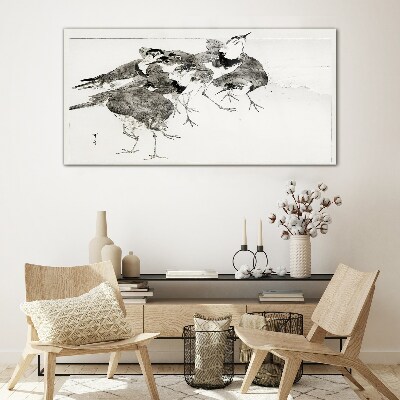 Glasbild Ein Vogelschwarm vor weißem Hintergrund
