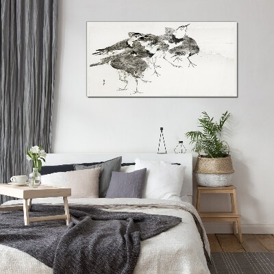 Glasbild Ein Vogelschwarm vor weißem Hintergrund