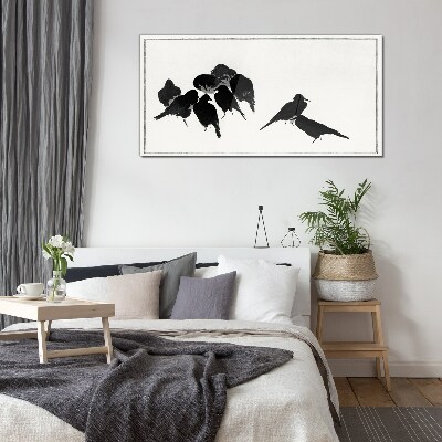 Glasbild Schwarze Vögel auf weißem Hintergrund