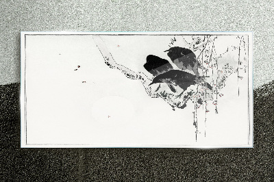 Glasbild Schwarze Vögel auf einem Ast