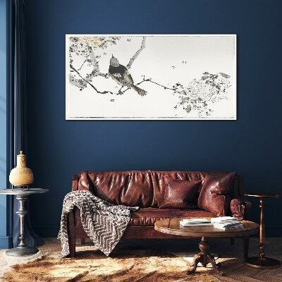 Glasbild Ein Vogel auf einem Ast in zarten Farben