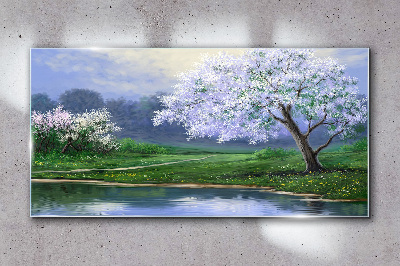 Glasbild Frühlingslandschaft mit blühenden Bäumen