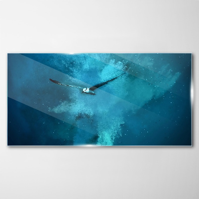 Glasbild Ein Vogel im blauen Raum