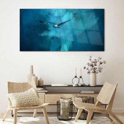 Glasbild Ein Vogel im blauen Raum