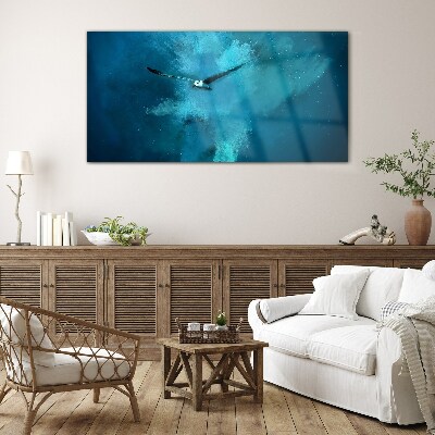 Glasbild Ein Vogel im blauen Raum