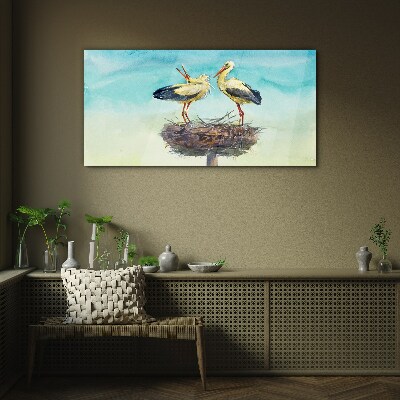 Glas bild Störche auf einem Nest im Blau