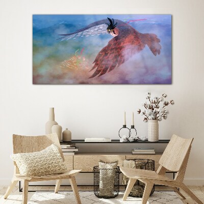 Foto glasbild Flug eines Raubvogels in den Wolken