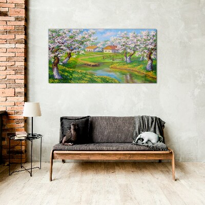 Glasbild Frühlingslandschaft mit blühenden Bäumen