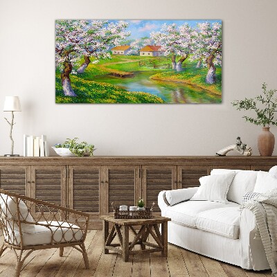 Glasbild Frühlingslandschaft mit blühenden Bäumen