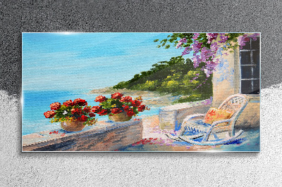 Glasbild Blumen und Meer in einer sonnigen Landschaft