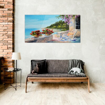 Glasbild Blumen und Meer in einer sonnigen Landschaft
