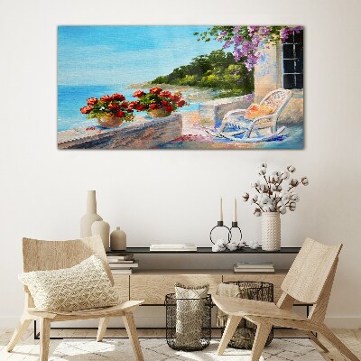 Glasbild Blumen und Meer in einer sonnigen Landschaft