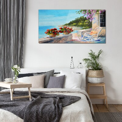 Glasbild Blumen und Meer in einer sonnigen Landschaft