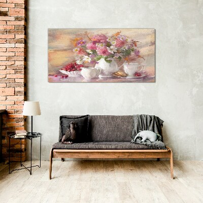 Glasbild Blumenarrangement auf dem Tisch
