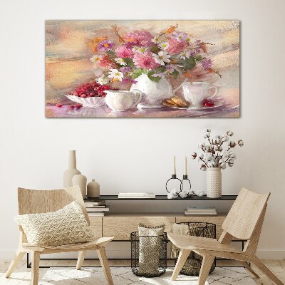 Glasbild Blumenarrangement auf dem Tisch
