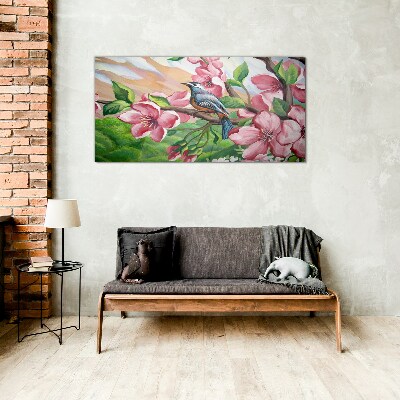 Foto glasbild Ein Vogel vor einem Hintergrund aus Frühlingsblumen