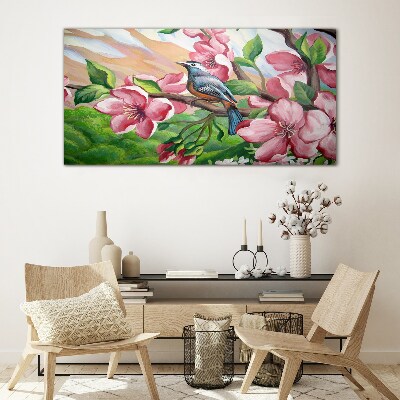 Foto glasbild Ein Vogel vor einem Hintergrund aus Frühlingsblumen