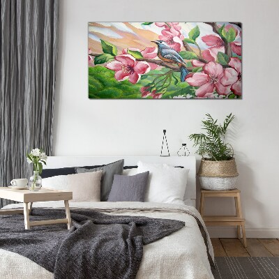 Foto glasbild Ein Vogel vor einem Hintergrund aus Frühlingsblumen