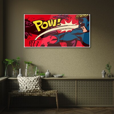 Glasbild Superheld in Aktion