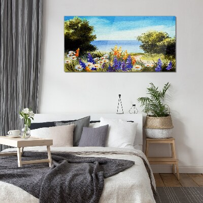Glasbild Landschaft mit Blumen am Meer