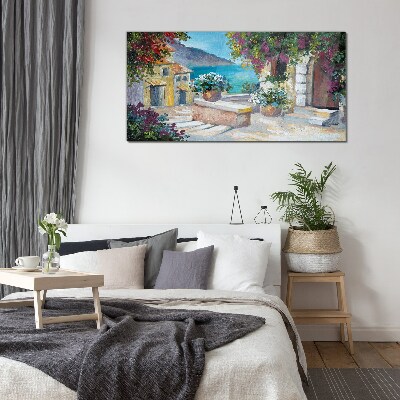 Bild auf glas Eine Küstenstadt voller Blumen