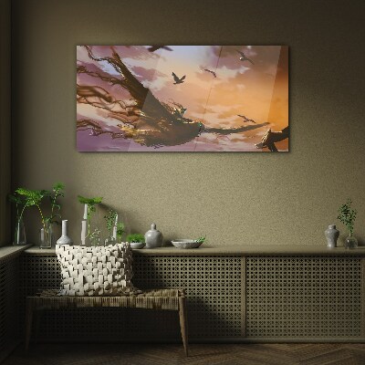 Glasbild Vogelflug in der untergehenden Sonne