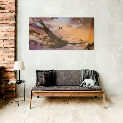 Glasbild Vogelflug in der untergehenden Sonne