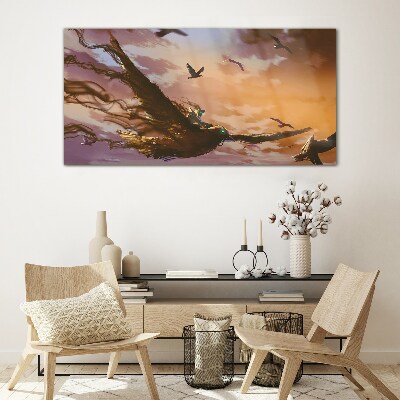 Glasbild Vogelflug in der untergehenden Sonne
