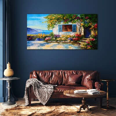 Glasbild Küstenlandschaft mit Blumen