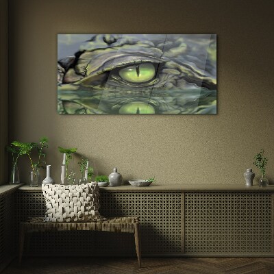 Bild auf glas drucken Froschauge in Wasserreflexion