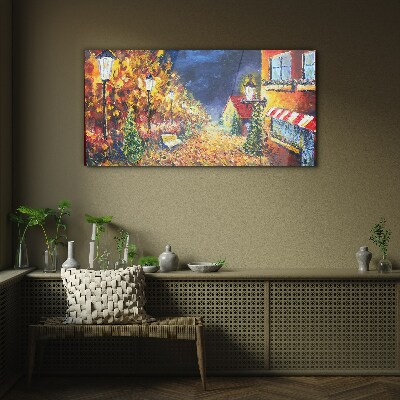 Glasbild Goldene Allee im Schein der Laternen