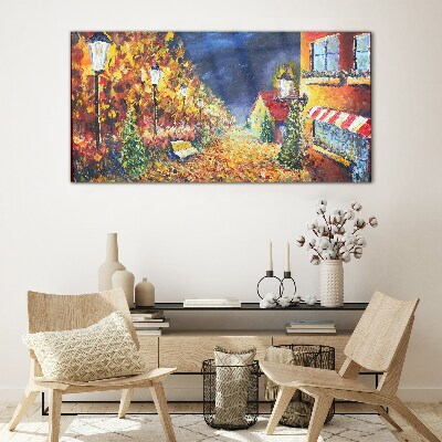 Glasbild Goldene Allee im Schein der Laternen