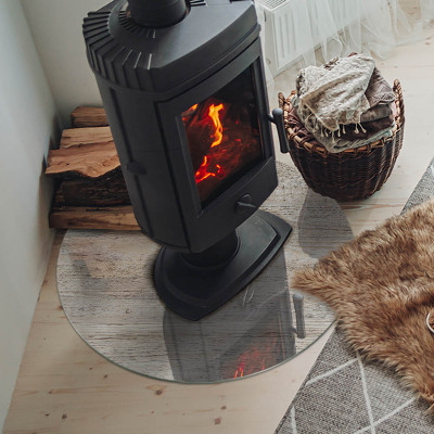 Runde Kamin Glasplatte Helle Holzstruktur