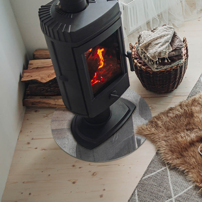 Runde Kamin Glasplatte Rohbetonstruktur