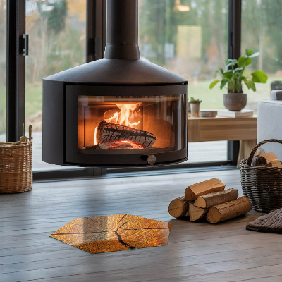 Sechseckige Glasplatte für Kamin Ein Querschnittsbild von Holz mit deutlicher Maserung