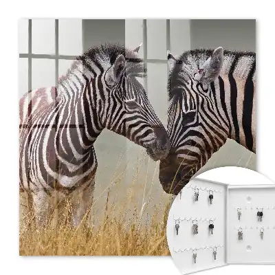 Zebras zusammen auf beigem Hintergrund