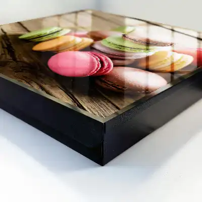 Bunte Süßigkeiten auf Holzgrund