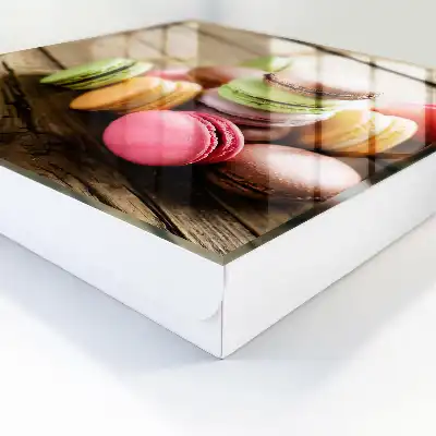 Bunte Süßigkeiten auf Holzgrund