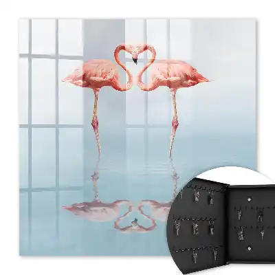 Flamingos lieben am Wasser